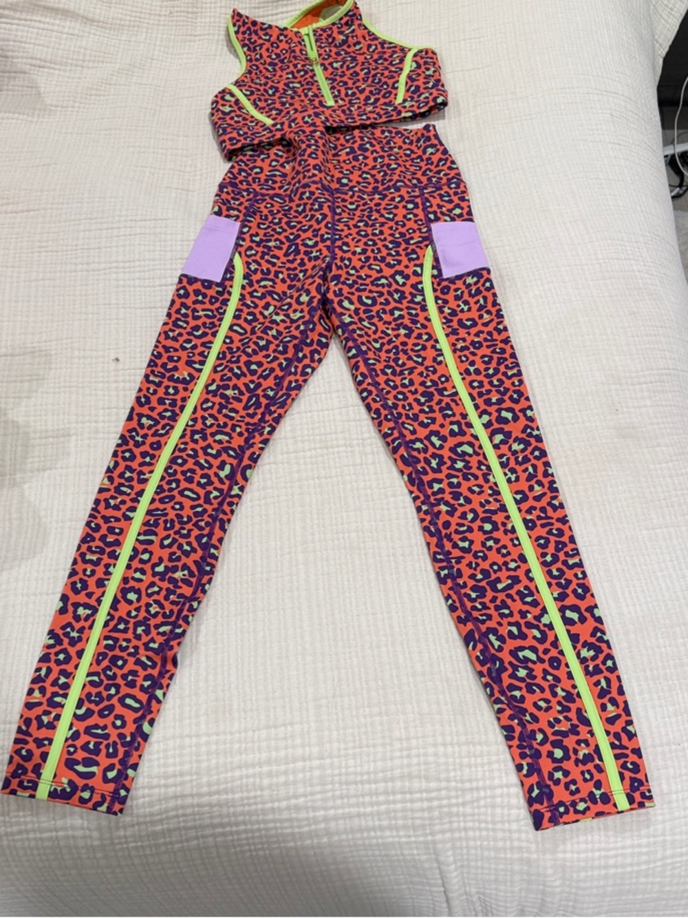 Peloton Neon Coral Leopard Print Jumpsuit with Lime Trim and Lavender Pockets